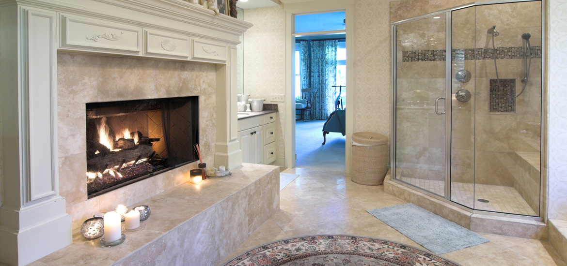 opulent bathroom with fireplace and marble